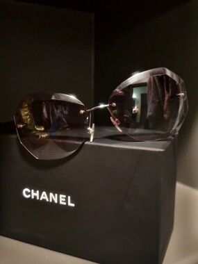 CHANEL Rimless Sunglasses with Gradient Smoke Lenses and Gold Accents